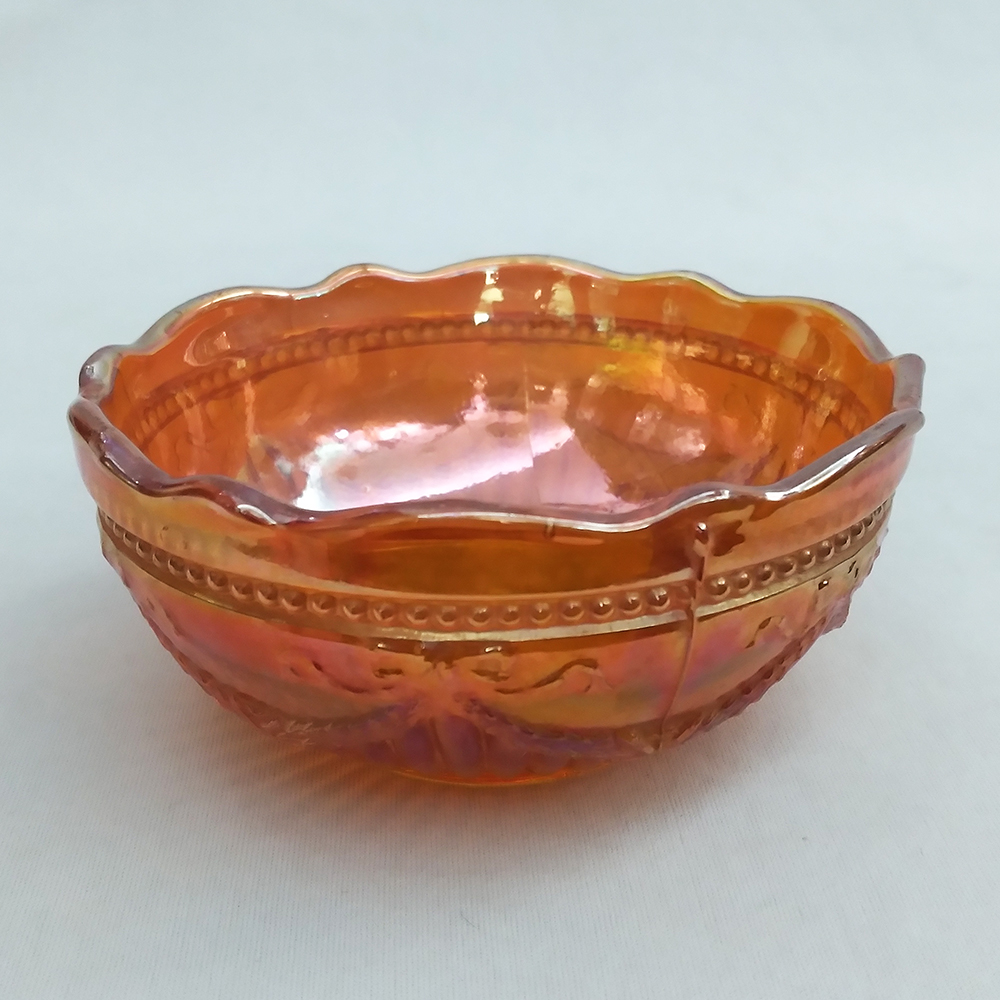 CR 78 – Lavanda ou tigela pequena em vidro amberina ou Carnival Glass da Esberard  decorada com guirlandas